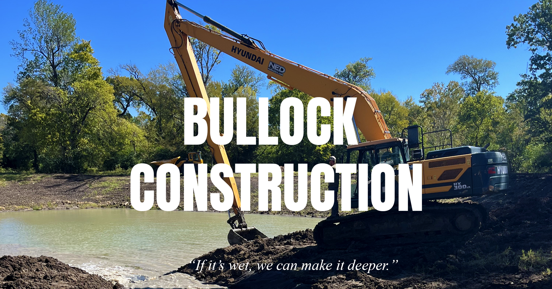 Bullock Construction - "If it's wet, we can make it deeper." This image shows an excavator working in an enclosed forested area dredging mud out of a waterway.