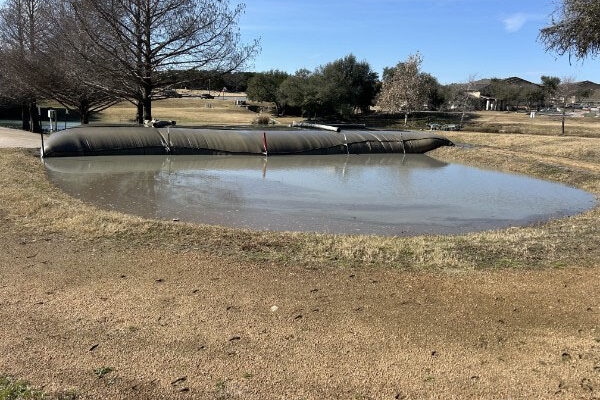 Austin Water Quality Dredging Project – Geotextile Tube Before Sediment Removal